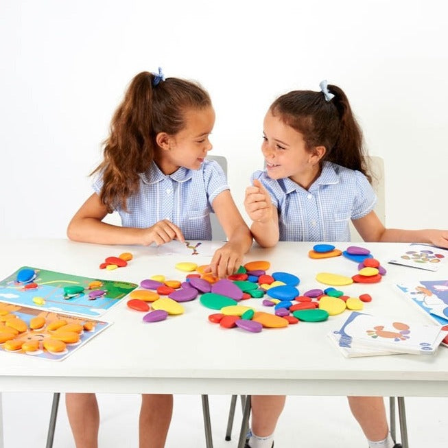 Rainbow Pebbles® Classroom Set,The edx education® Rainbow Pebbles® Classroom Set is fantastic for children to play, learn and get creative! These safe, smooth and tactile pebbles will spark your child's curiosity and encourage them to use their imagination to develop unique and interesting ways to incorporate them into play. Their odd shape makes them wobble when stacked, creating an extra challenge for young learners, and developing fine motor skills. Their rainbow colours and tangible texture make them id