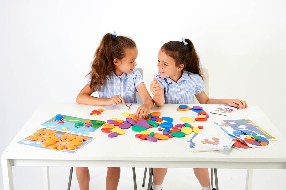 Rainbow Pebbles® Classroom Set,The edx education® Rainbow Pebbles® Classroom Set is fantastic for children to play, learn and get creative! These safe, smooth and tactile pebbles will spark your child's curiosity and encourage them to use their imagination to develop unique and interesting ways to incorporate them into play. Their odd shape makes them wobble when stacked, creating an extra challenge for young learners, and developing fine motor skills. Their rainbow colours and tangible texture make them id