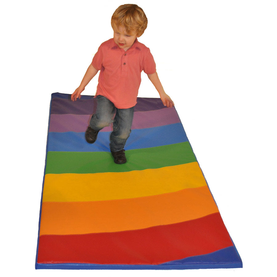 Rainbow Play Mat,The Rainbow Play Mat combines a safety surface suitable for all active play with fun floor games. The games will encourage number, colours and shapes recognition, sequencing and agility whilst improving social skills. The Play Mats are made in high density foam with a wipe clean high tenacity PVC cover. 180cm x 90cm x 3.5cm Expected delivery 10 working days Hand made in the UK, Rainbow Play Mat,Softplay mat,Soft play mat,Tumble play mat,soft play floor mat,sensory floor soft play,toddler so