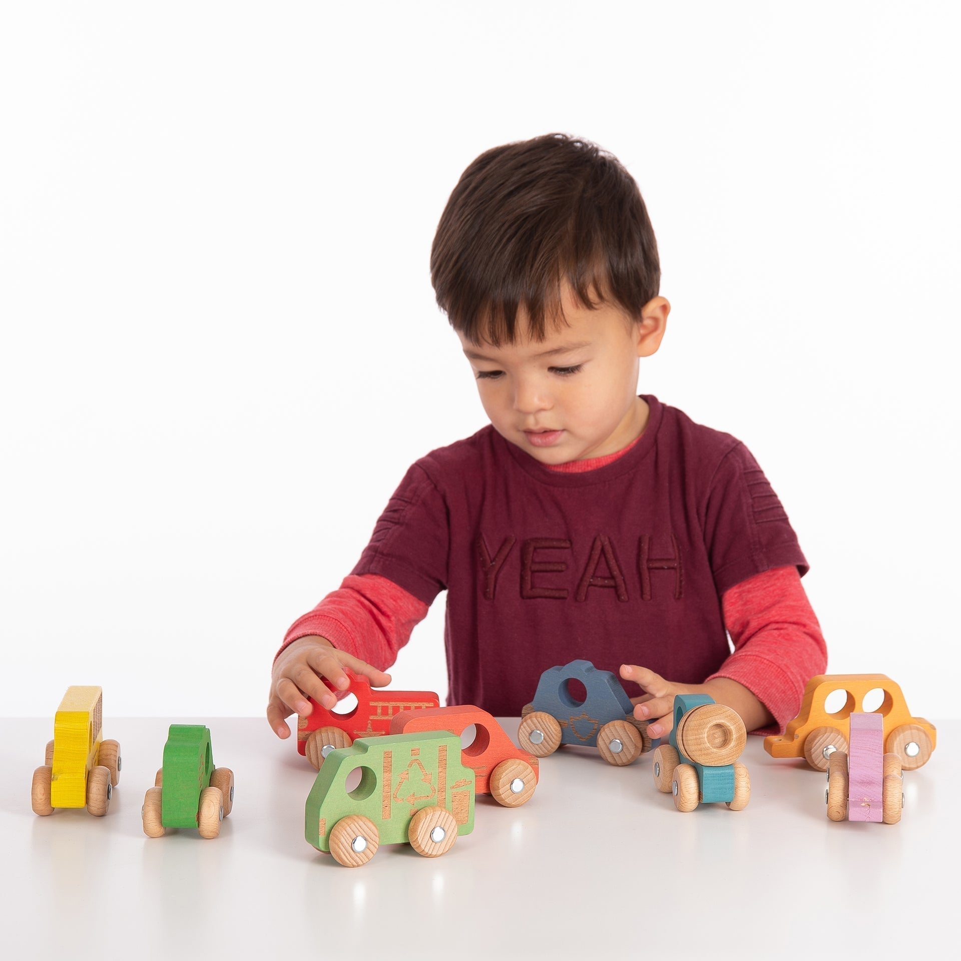 Rainbow Wooden Community Vehicles,Rainbow Wooden Community Vehicles The TickiT® Rainbow Wooden Community Vehicles set is perfect for little transport enthusiasts, providing a range of vibrant and engaging vehicles for imaginative play. Made from smooth solid beechwood with a natural woodgrain finish, these tactile vehicles come in the seven different colours of the rainbow and are intricately detailed with laser engravings. They feature rotating wheels and robust metal axles, making them durable and fun for