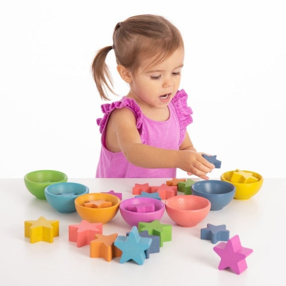 Rainbow Wooden Stars,Our TickiT® Rainbow Wooden Stars are made from beautiful beechwood with a natural woodgrain finish in the seven colours of the rainbow, and in differing sizes and thickness. These chunky wooden star pieces are perfect for children to handle and learn about colour and shape, whilst having fun learning to count, sort, stack and sequence. As your child plays they will be developing their manual dexterity and fine motor skills as well as supporting early numeracy and colour recognition. For