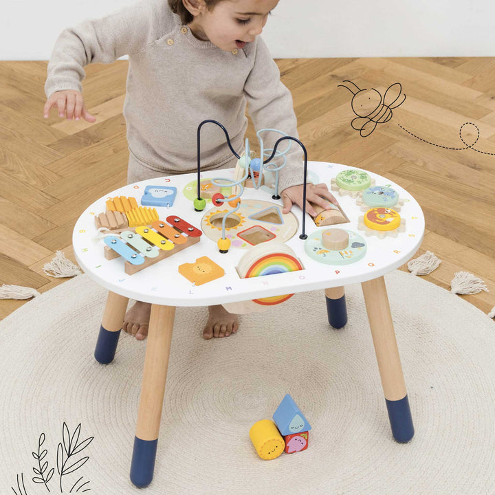 Sensory Activity Table,Sensory Activity Table: A Multi-Sensory Playground for Toddlers Introduce your little one to a world of discovery with the Sensory Activity Table, a feast for the eyes and the senses. This incredible activity table is designed to captivate developing imaginations and provide hours of hands-on fun for toddlers. Key Features Multi-Sensory Engagement: Packed with a host of features including a bead maze, shape sorter, xylophone, scratch board, turning gears and cogs, and a spinning rattl