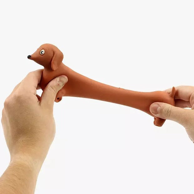 Stretchy Sausage Dog Fidget Toy,Stretchy Sausage Dog Fidget Toy Description: Sausage dogs are already adorable little stretchy bois, but thanks to this awesome gizmo, you can really put them to the test—the stretch test, that is. Stretch makes things better—your muscles, a limousine, and the truth... well, maybe not the last one. But this Stretchy Sausage Dog Fidget Toy is specifically designed to be stretched, prodded, shaped, and fiddled with until the cows come home. Features: Stretch and Shape: Mold, st