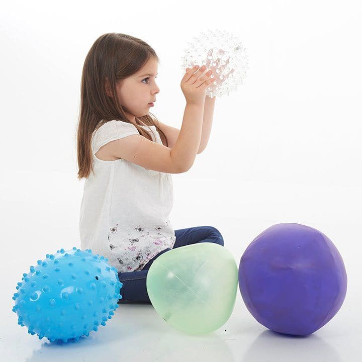 Tickit Odd Balls Set,The Tickit Odd Balls Set introduces a unique and engaging way for children and adults alike to enjoy playtime while enhancing a variety of developmental skills. This set comprises four inflatable balls, each boasting a distinct shape, color, and textured surface, designed to captivate and stimulate the senses during play. Key Features of the Tickit Odd Balls Set: Distinctive Shapes and Textures: The varied shapes and textures of the Tickit Odd Balls Set not only provide a fascinating ta