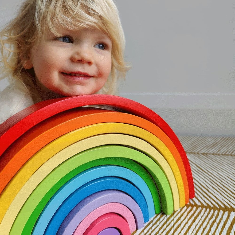 Wooden Rainbow Stacking Toy-Large,Endless Stacking Fun with the Large Wooden Rainbow Stacking Toy Unlock the imagination and creativity of your little one with the Large Rainbow Stacking Toy. This versatile and durable toy offers endless play possibilities without any rules or guidelines, making it an ideal addition to any playroom or nursery. Key Features: Versatile Stacking: With its vibrant rainbow-colored arches, this stacking toy provides endless opportunities for creative exploration. Little hands can